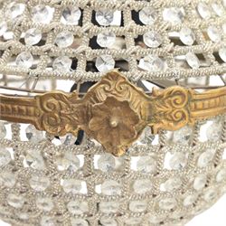 Late 19th century pair of French Empire gilt metal and cut glass bag chandelier, the tapering body formed of faceted glass button drops, with lobed lower bowl, cast foliate and mask mounts, surmounted by a bulbous upper section and terminating with a pendant finial