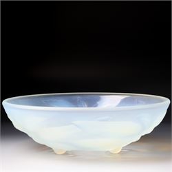 G Vallon, a French opalescent glass bowl decorated with a raised pattern of cherries and leaves signed G Vallon D23cm