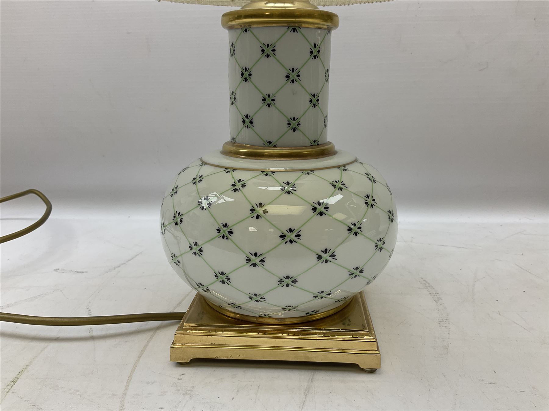 Italian ceramic table lamp decorated with geometric green and black pattern on white ground with gilt metal square plinth base, together with a green and black marbled effect lamp by Holkham pottery, both with shades, tallest H47 incl shade