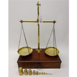  Set of late 19th century brass Chemists balance Scales, beam stamped Gatchell & Sons, on mahogany single drawer base & a set of Avery brass cylindrical weights 500g to 1g, H58cm, W40cm   