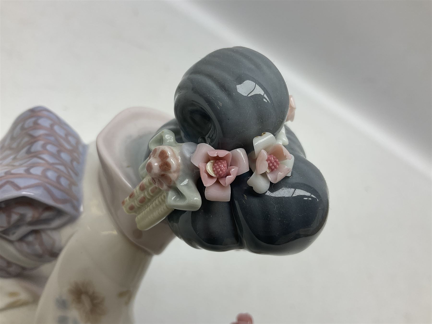 Two Lladro Japanese Ladies figures, comprising Kiyoko no 1450 and Yuki no 1448, both issued 1983, retired 1998, largest example H20cm