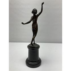 Bronze figure modelled as a nude woman with one arm raised a crescent moon upon her forehead, raised upon a circular stepped plinth, H36cm