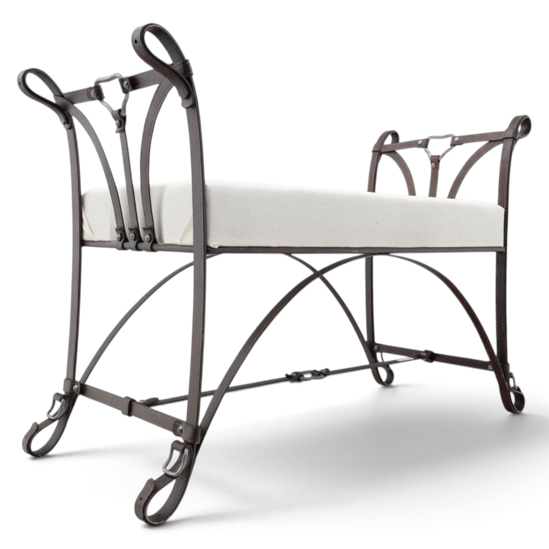 And So To Bed - 'Handel' wrought iron window seat, the rectangular upholstered seat enclosed by scrolling and arched ends with shaped uprights, on scrolling supports united by curved stretchers