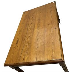 19th century pitch pine dining table, rectangular moulded top, on turned supports 