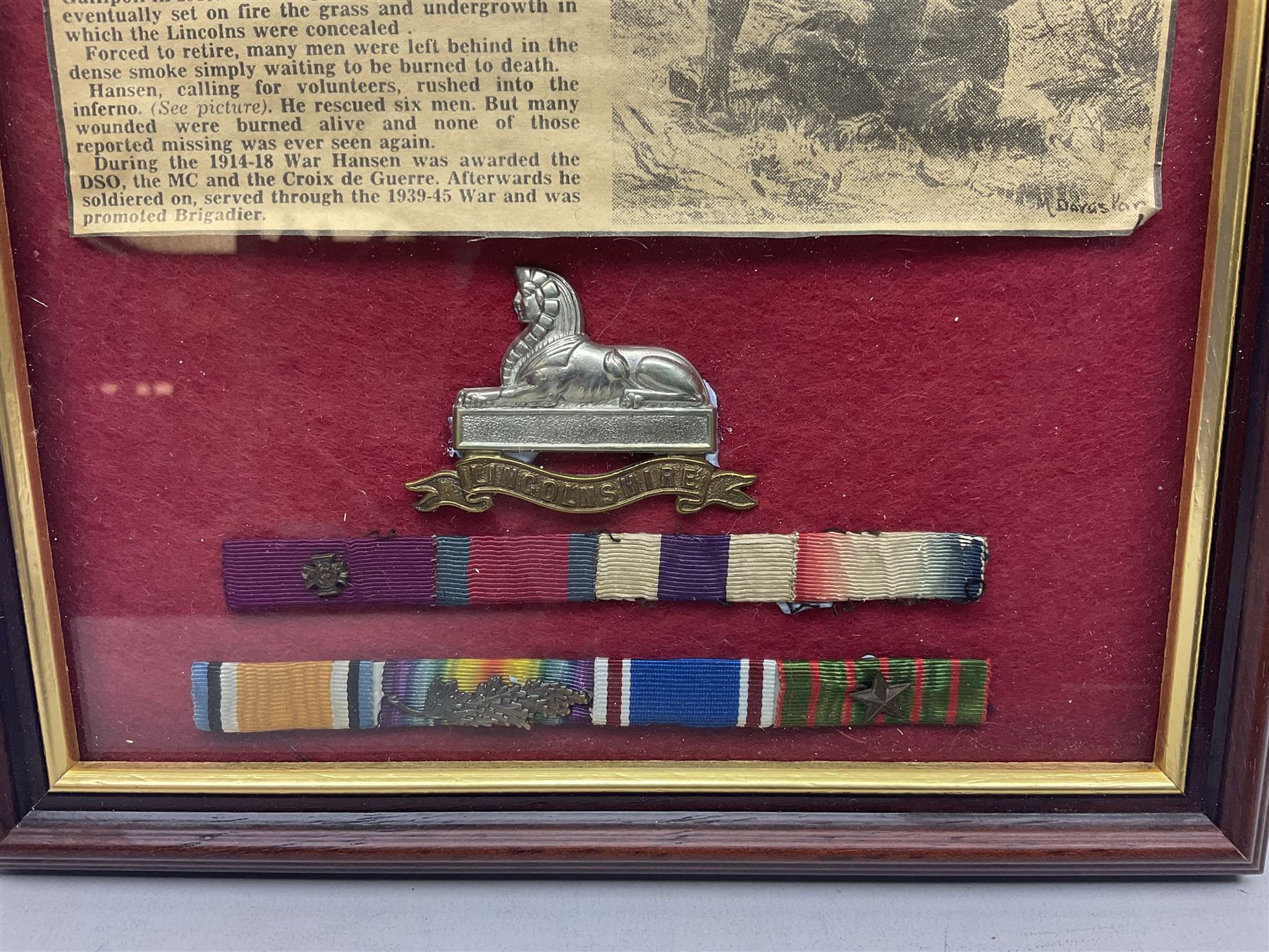 Captain (later Brigadier) Percy Howard Hansen V.C., D.S.O., M.C. 6th (Service) Battalion Lincolnshire Regiment - representative group of thirteen miniature dress medals comprising VC, DSO, MC, WW1 trio, GSM with Palestine clasp, four WW2 medals/stars, George VI Coronation Medal and French Croix-De-Guerre with MID leaves; all with ribbons on pinned bar for wearing; together with display of contemporary tunic ribbon bars for eight medals, framed with Lincolnshire Regiment cap badge, newspaper cutting and London Gazette extract; framed head and shoulder portrait of Hansen in uniform clearly showing his medal bars; and copies of related biographical information. Auctioneer's Note: Extract from the London Gazette 1st October 1915 regarding the VC 'For most conspicuous bravery on the 9th August 1915, at YILGHIN BURNU Gallipoli Peninsular. After the second capture of the 