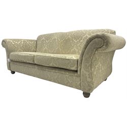 Traditional design three-piece lounge suite - three-seat sofa (W220cm, H90cm, D90cm); two armchairs (W115cm); and two footstools (77cm x 43cm, H31cm); upholstered in cream damask fabric