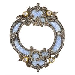 Early 20th century Continental enamel and diamond brooch, the pale blue guilloche enamel, with applied silver decoration set with old cut diamonds, mounted onto a gold pierced border