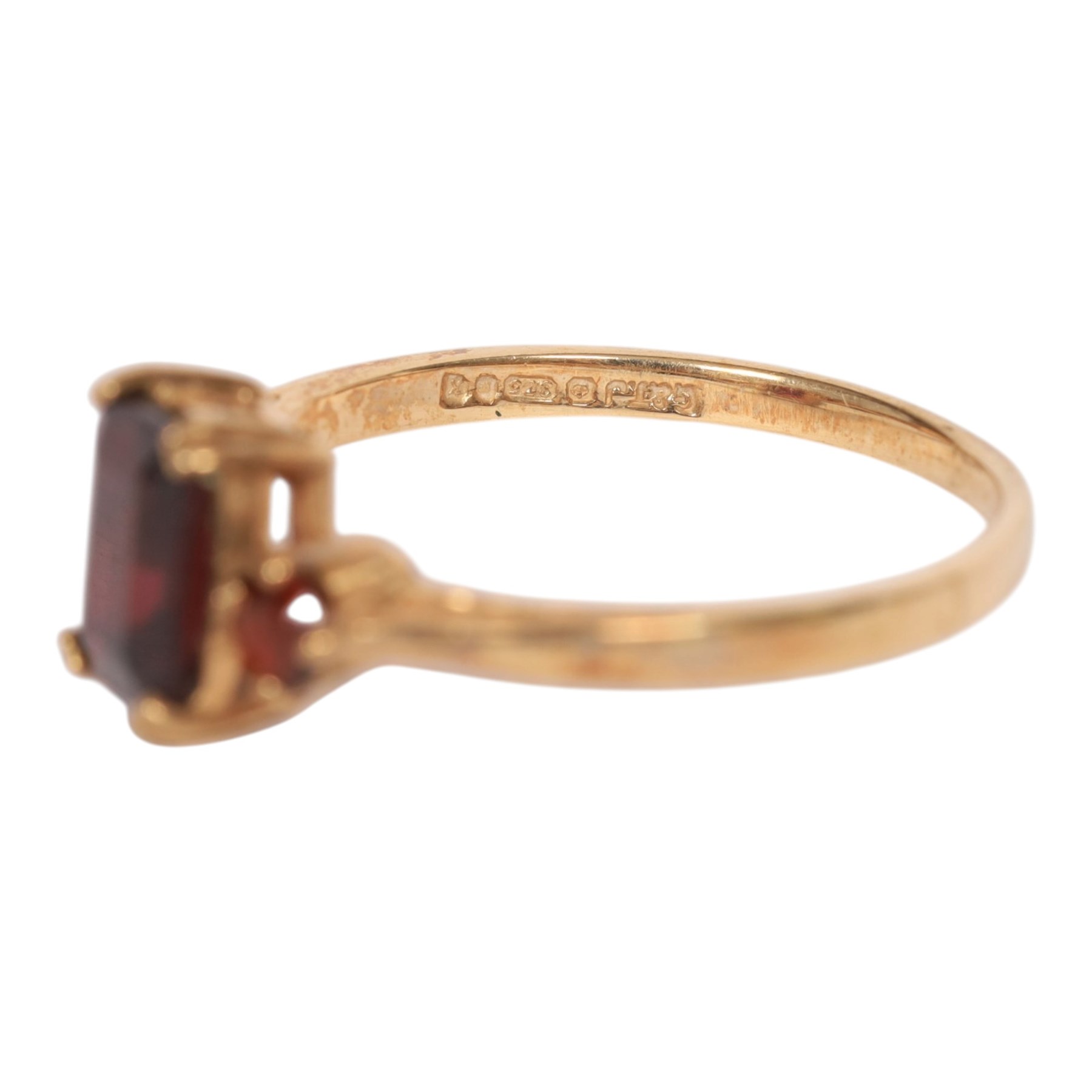 Gold coral and pearl ring and a gold three stone garnet ring, both hallmarked 9ct
