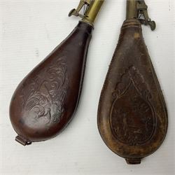 Two leather shot flasks with embossed decoration and brass nozzles; scissor action bullet mould with two ladles; pair of 19th century J.B. Warrilow hammer actions; small quantity of Staybrite buttons; and 1968 dated metal ammunition tin for 200 x 7.62 blank cartridges