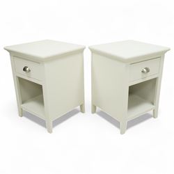 Barker & Stonehouse - pair of Carrington white bedside chests, each with moulded rectangular top over single drawer with brushed steel cup handle, open shelf below, on bracket feet