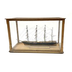 Model of a four masted sailing ship, with rigging in an oak framed case with four glazed sides and top, H28cm, L44cm, D21.5cm