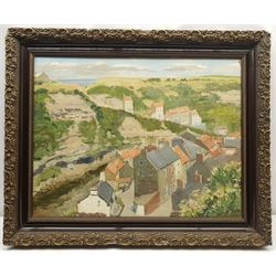 E C Clark (British 20th century): Church Street Staithes looking towards Cowbar, oil on board signed 50cm x 65cm