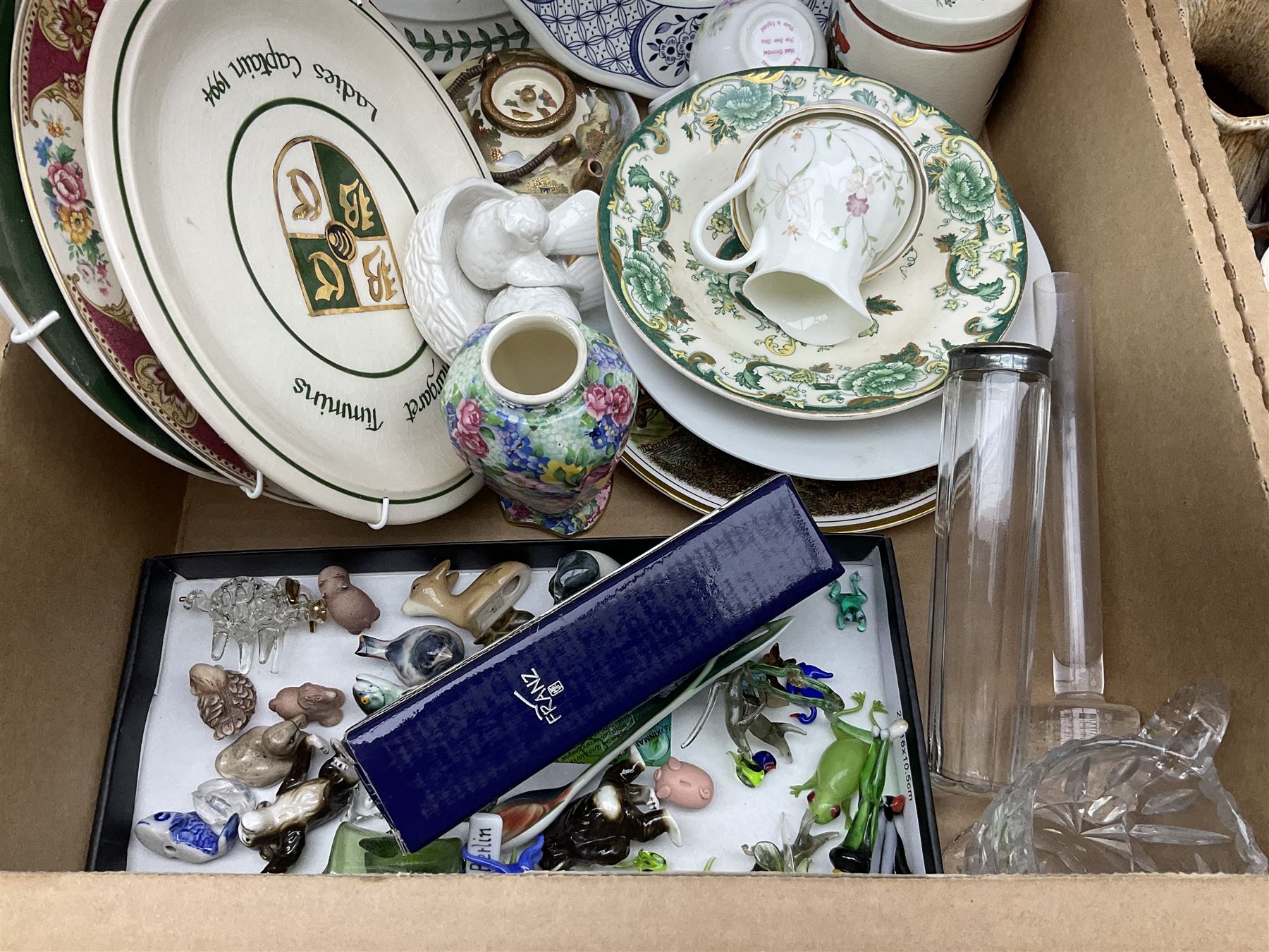 Quantity of various ceramics and glassware to include pair of Disney Mickey and Minnie Mouse cowboy Sherriff figures, stamped Japan beneath, Mason's ironstone, Wedgwood, Portmeirion, tea and dinner wares, collectors plates, glass animals etc in four boxes