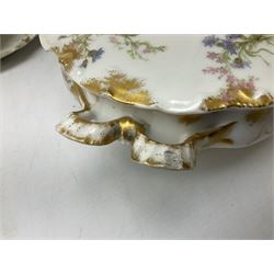 French Haviland Limoges part dinner service, decorated with floral sprays and gilding, to include two lidded tureens, thirteen plates, oval serving platter, etc, all stamped H & Co Made in France for James Green & Nephew (17) 