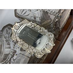 Edwardian silver plate mounted oak tantalus, containing three square sided cut glass decanters, complete with key, H33cm