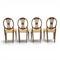 Bevan Funnell Reprodux - Regency design set of ten mahogany dining chairs, oval backs with central splat with rose motif, serpentine seat upholstered in damask fabric, raised on turned supports