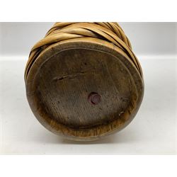 Late 19th century Tibet milk pail, the tapering body with twisted bindings and carring handle, H21cm