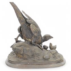 Bronzed figure group of a pheasant with six chicks upon a naturalistically modelled ground, after A. Arson, H45cm