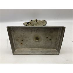 Cast iron fire companion set modelled as a knight in armour with fleur-de-lis shield and sword concealing fire poker, with brass tongs to reverse, raised upon stepped rectangular base, H55cm