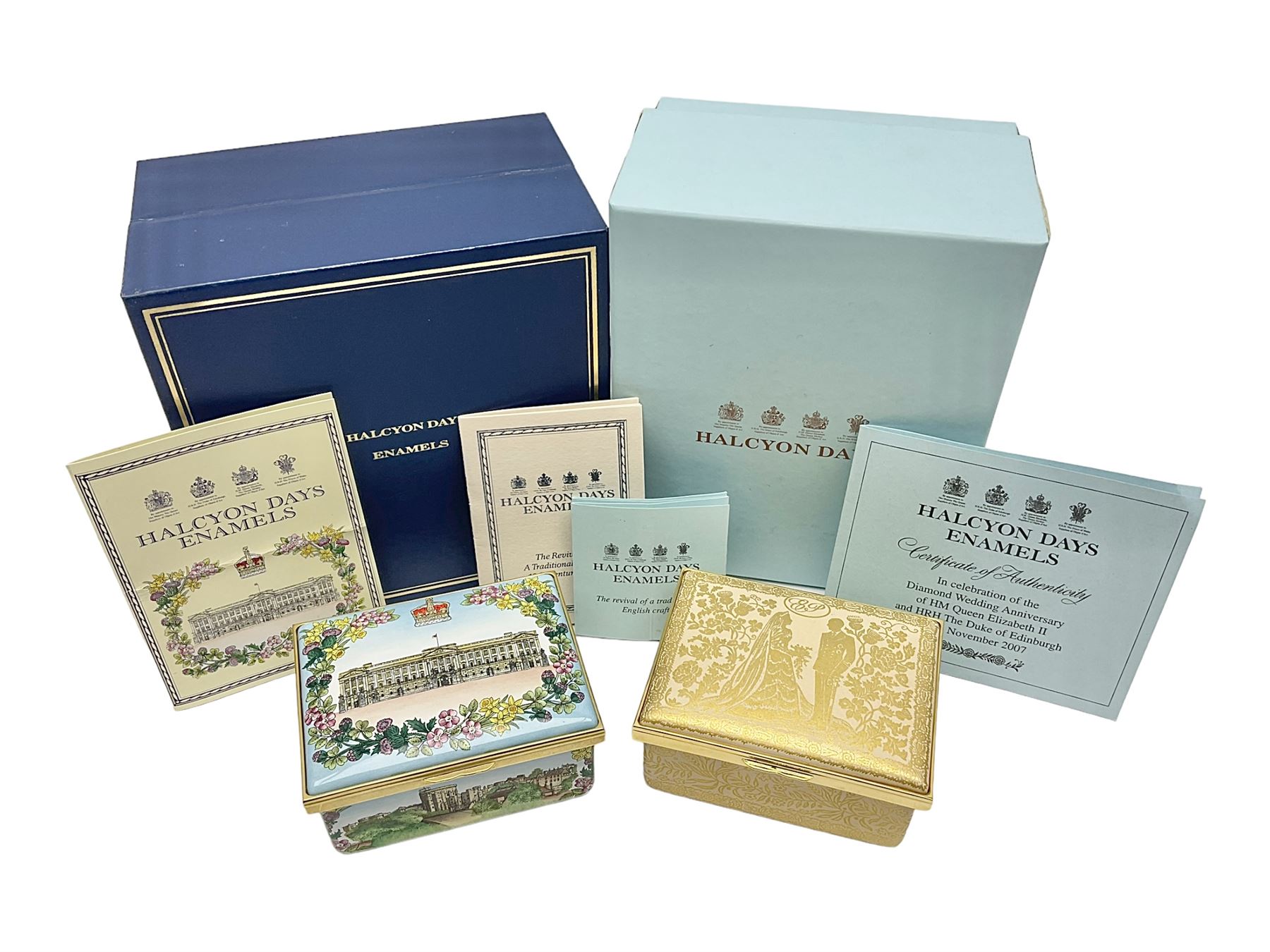 Two Halcyon Days enamel boxes, both of rectangular form, the first depicting Buckingham Palace, 'To Celebrate the Golden Jubilee of Her Majesty Queen Elizabeth', the second depicting the marriage of The Queen and Prince Philip, in celebration of their Diamond Wedding Anniversary, H4cm, W8.5cm, both boxed