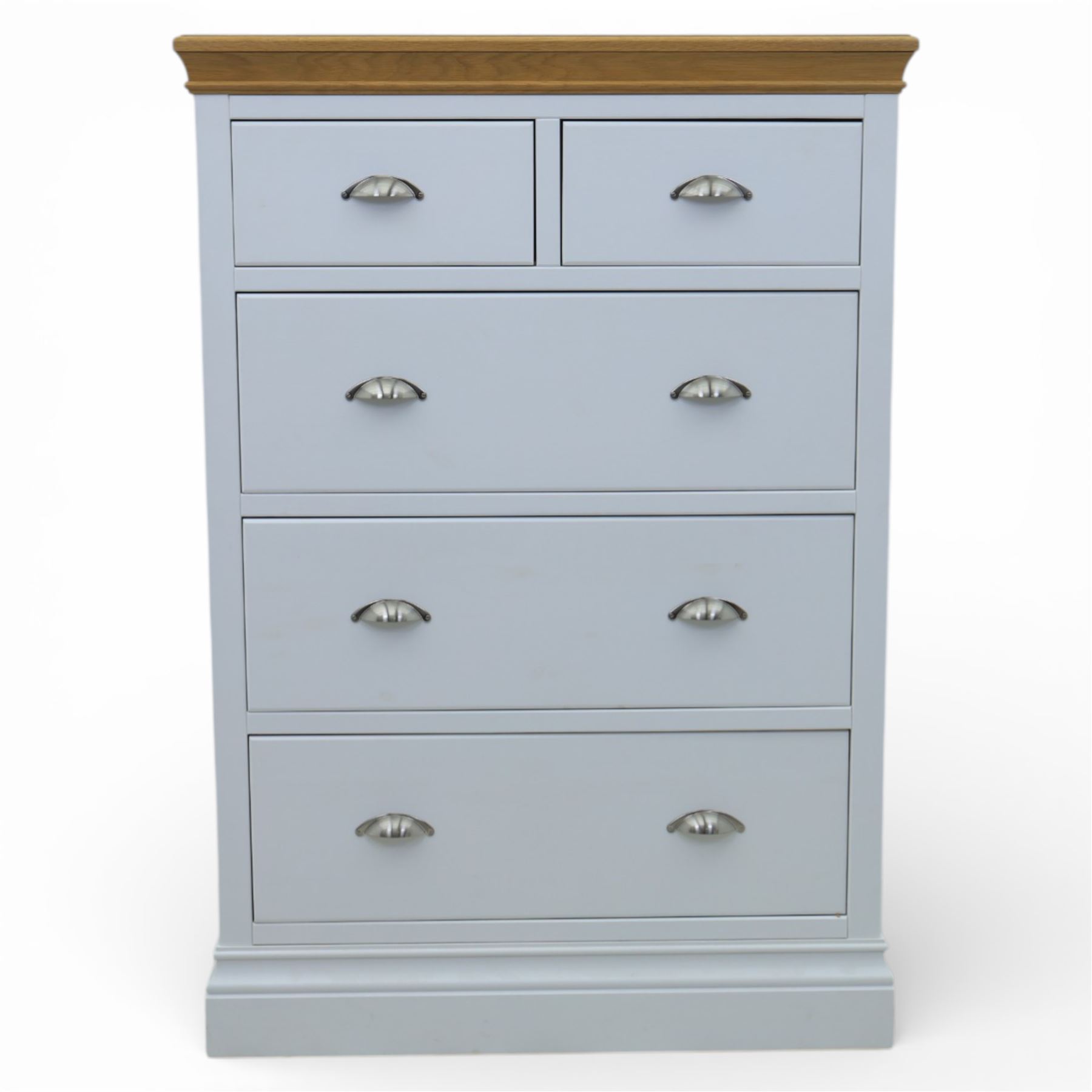 Modern chest of two short and three long drawers in white finish with oak moulded top, with metal cup handles, raised on a moulded plinth base
