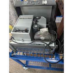 Collection of projectors, epidiascopes, magic lantern and similar, including Bell & Howell 621 projector, mahogany and brass magic lantern, Helper 6S projector, Leitz epidiascope, Zeiss epidiascope, Johnson Optiscope, etc
