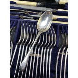 Late 19th/early 20th century composite canteen of silver flatware, contained within an early 20th century mahogany serpentine fronted case with twin drop carry handles, and hinged cover with boxwood stringing and central inlaid shell motif, above a single drawer with twin ring handles and Wellington style locking system, the cover and drawer opening to reveal plaque for Spink & Sons Ltd London, and fitted interior containing ivory handled knives, ivory handled carving set, and silver Hanoverian and Old English pattern cutlery, each with engraved monogram to terminal, hallmarked London, makers Spink & Son (John Marshall Spink), Goldsmiths & Silversmiths Co, and Chawner & Co (George William Adams), various dates ranging 1880-1923, gross weighable silver 92.59 ozt (2880 grams)
