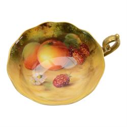 Royal Worcester fruit painted cabinet scallop edge teacup and saucer,  interior hand painted with apples and berries upon a mossy ground, the cup exterior and centre of saucer gilded, cup signed W. Bee and saucer signed H. Ayrton, each with puce coloured printed marks beneath, H8cm
