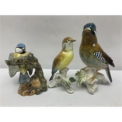 Eight Karl Ens bird figures, together with Mack blue tit and one other