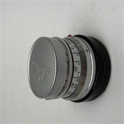 Leica M2-1013180 camera fitted with Leica Summicron 1:2/50 Leitz Wetzlar lens (1764800) and UVa filter, and Leica-Meter MR in leather case together with; Leica Elmarit 1:2.8/90 LW lens (1805634), Leica Summaron 1:28/35 LW lens (1782507), Leica M3 M2 adapter ring, Leica filters yellow and orange cased, three Leica lens hoods IUFOO, IROOA and 12585H (boxed), Leica pocket book, guide and 1960s survey catalogue & price guide leaflet, with original M2 camera box