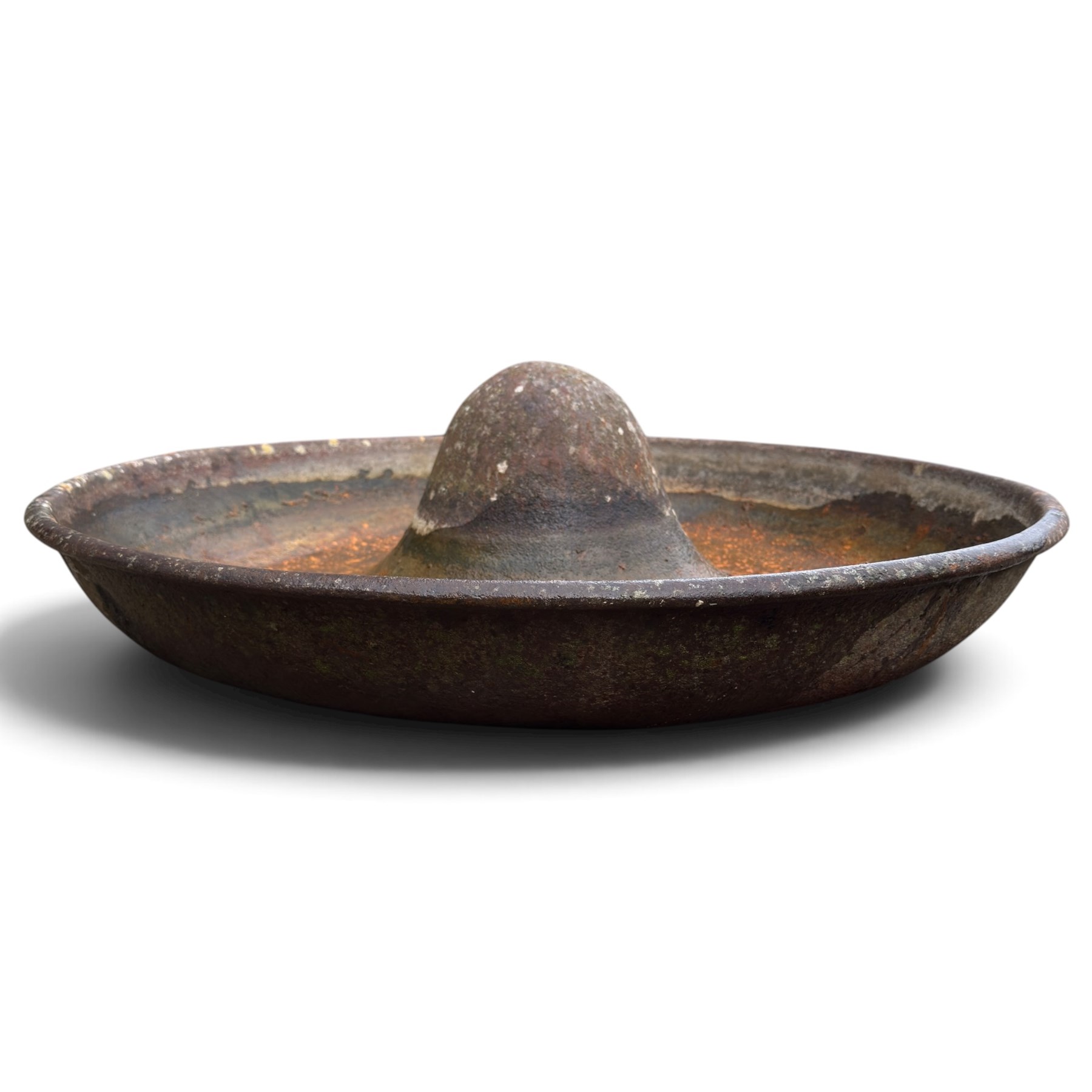 Two early 20th century cast iron ‘Mexican hat’ pig trough planters, each of circular dished form with central domed boss, one fitted with fixing studs for radial feeding divisions