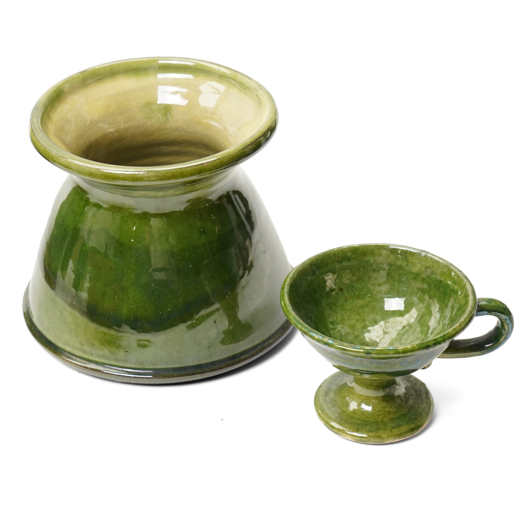Collection of studio pottery, in green glazes, mostly unmarked, tallest H23cm (7)