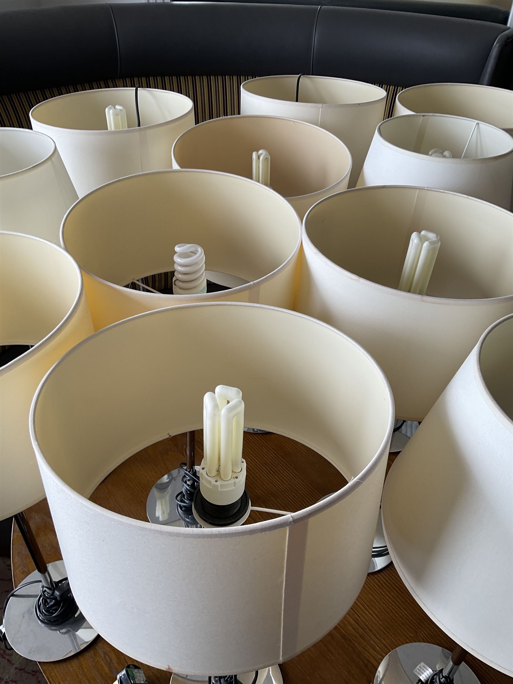 Set of twelve chrome table lamps with various shades (12)- LOT SUBJECT TO VAT ON THE HAMMER PRICE - To be collected by appointment from The Ambassador Hotel, 36-38 Esplanade, Scarborough YO11 2AY. ALL GOODS MUST BE REMOVED BY WEDNESDAY 15TH JUNE.