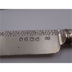 Victorian silver cutlery set, comprising knife, fork and spoon, all profusely engraved with flower heads, each with initials terminals, hallmarked Chawner & Co Birmingham 1877, contained within tooled leather, velvet and silk lined fitted case