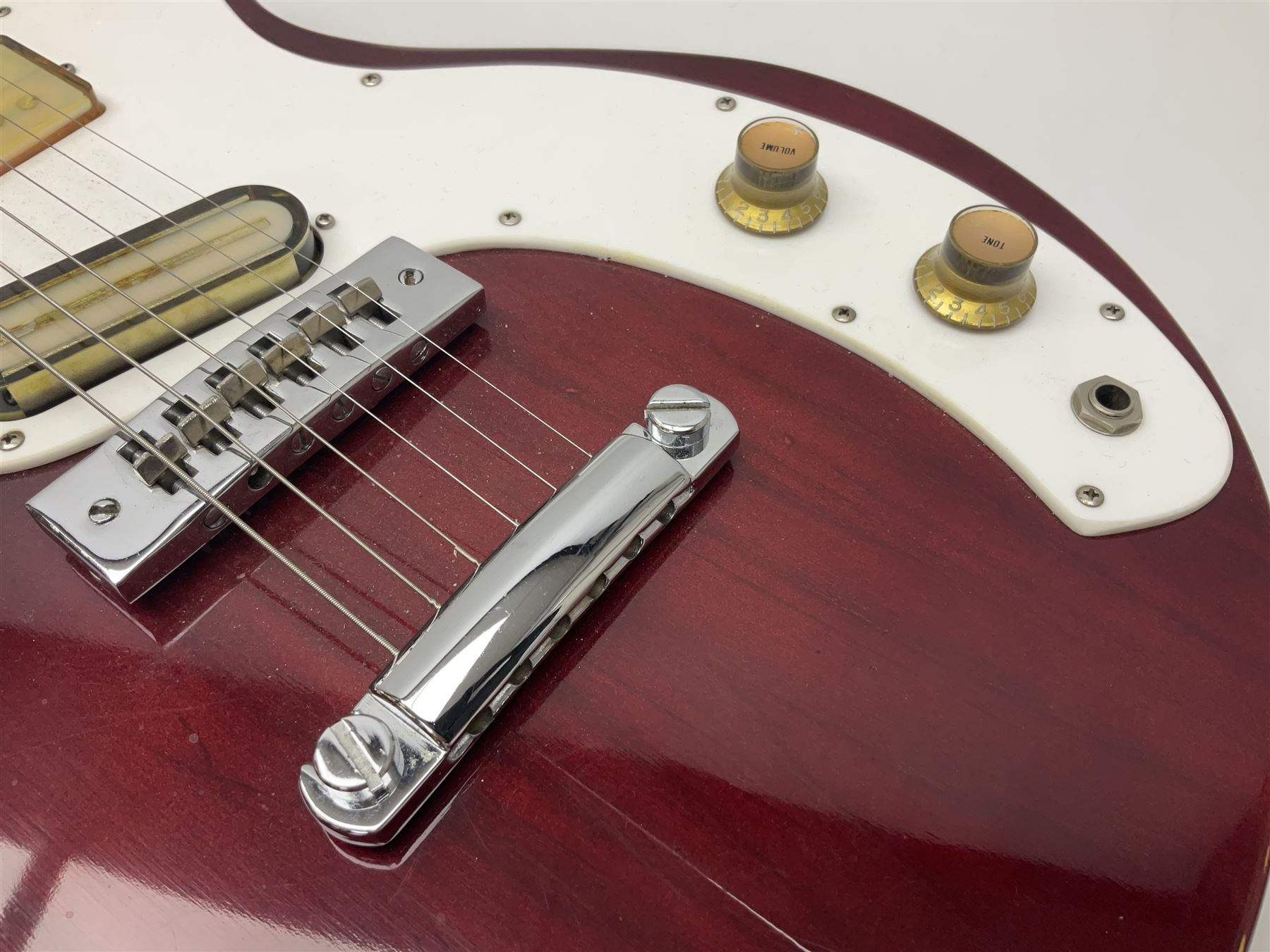 Gibson Marauder style six-string electric guitar with cherry coloured body, marked made in Japan L101cm; in locking hard carrying case