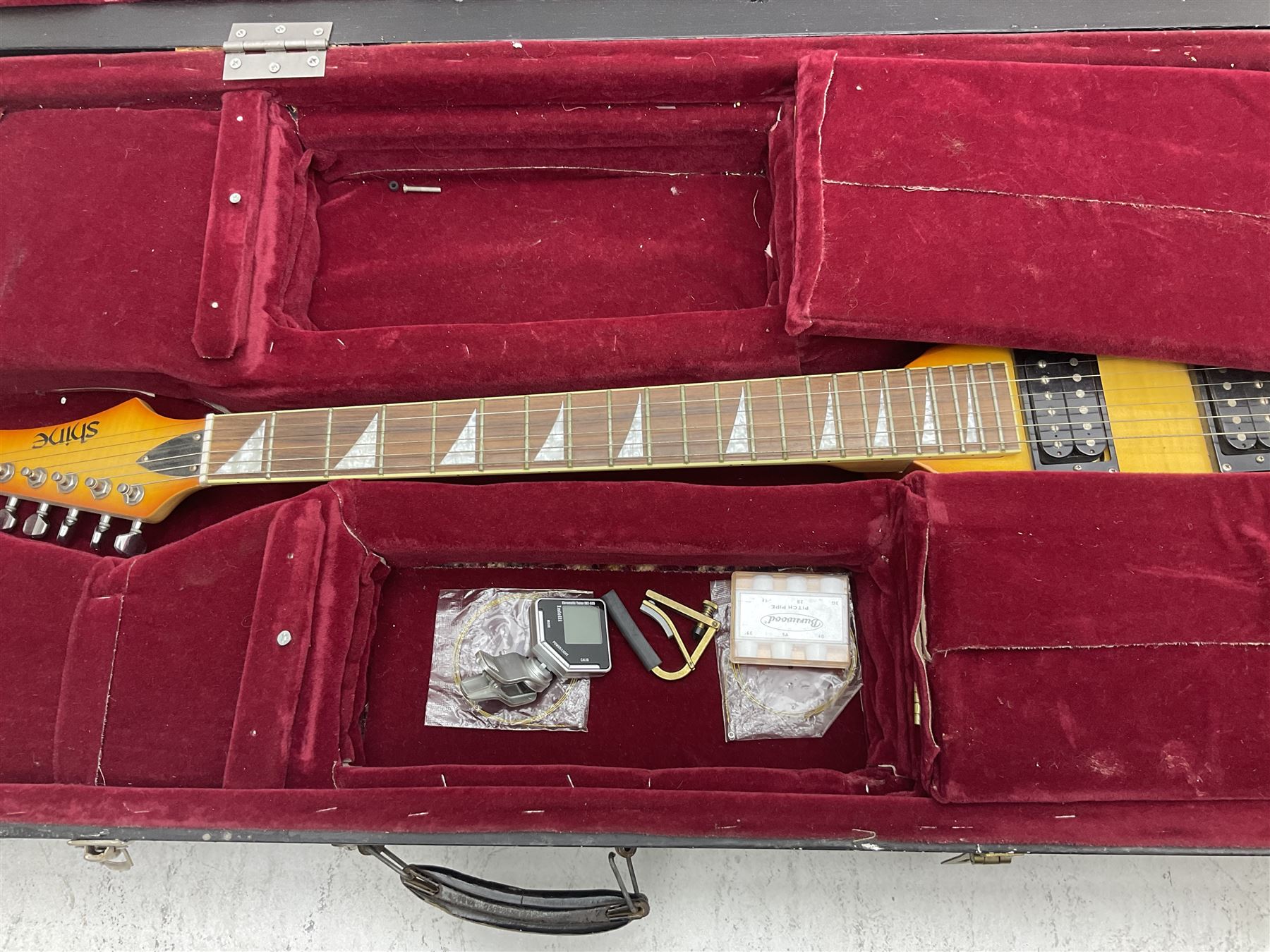 Shine offset V-shaped six string electric guitar, in fitted case