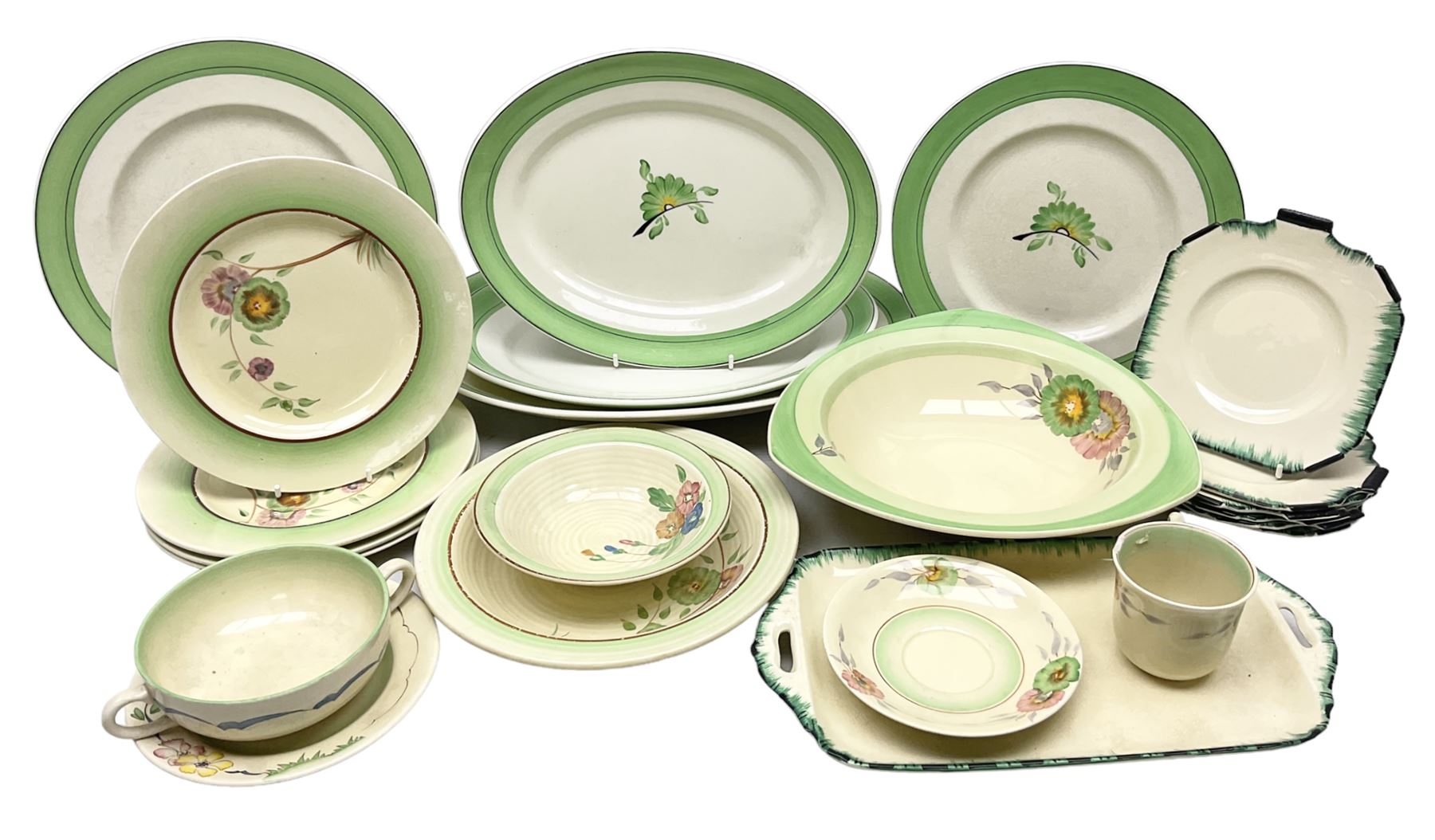 Clarice Cliff for Newport Pottery Corolla pattern tea and dinner wares, comprising triangular bowl, four side plates, two shallow bowls and teacup (a/f), together with a Clarice Cliff Wilkinson twin handled soup bowl and unassociated saucer both decorated with pink and yellow flowers, together with other mid century ceramics comprising Parrott and Company Coronet Ware, and Royal Staffordshire AJ. Wilkinson Ltd dinner wares