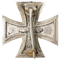 German Third Reich Krim shield arm badge 1941-1942, Auxiliary Cruiser badge and a WWI first class Iron Cross with field conversion (3) 