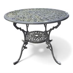 Cast aluminium garden table and four chairs in dark grey