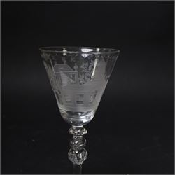 Dutch engraved Newcastle light baluster glass, circa 1760, the funnel bowl engraved with a two storey country house and church flanked by trees, beneath the inscription ‘T WELVAREN VAN LANDT ENKERK’ (The prosperity of the Country and Church), upon a multi knopped stem with beaded knop and basal knop, over conical foot, H18cm



