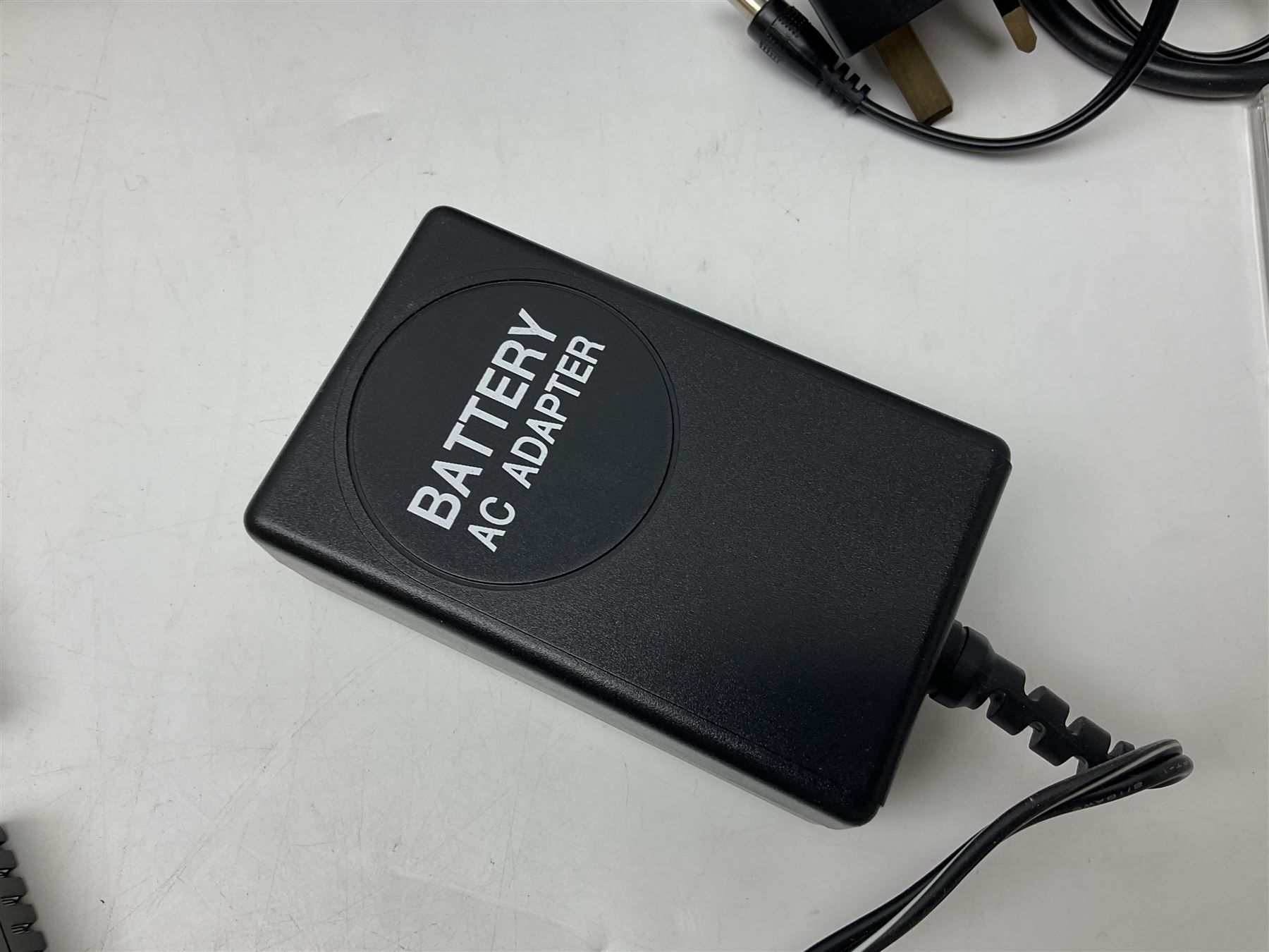 Canon EOS 1n Digital camera body, serial no. 260436, with 'Canon Zoom Lens EF 35-80mm 1:4-5.6 II Canon Inc. 52mm' lens, Kodak Professional DCS 520 digital module, and charger, serial no. K520C03165, together with Nikon F5 camera body with Kodak Professional DCS 760 digital module and charger, serial no. K760C03802