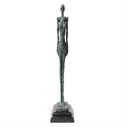 After Alberto Giacometti (Swiss 1901-1966): Femme Venise bronze upon a stepped marble base...