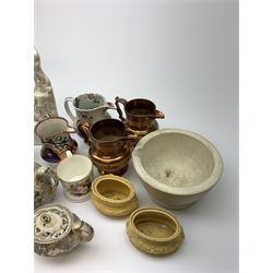 A group of 19th century ceramics, comprising agateware teapot with pewter cover, the body detailed with verse, a further example detailed A Present from Blackpool, large Wedgwood best composition mortar, two copper lustre jugs and a small cup, floral print decorated jug possibly Don Pottery, Gaudy Welsh jug, floral painted mug, Staffordshire nursery plate, teapot, and teacup and saucer, reticulated chestnut basket, Staffordshire bough group, plus a later Staffordshire style dog. (9). 