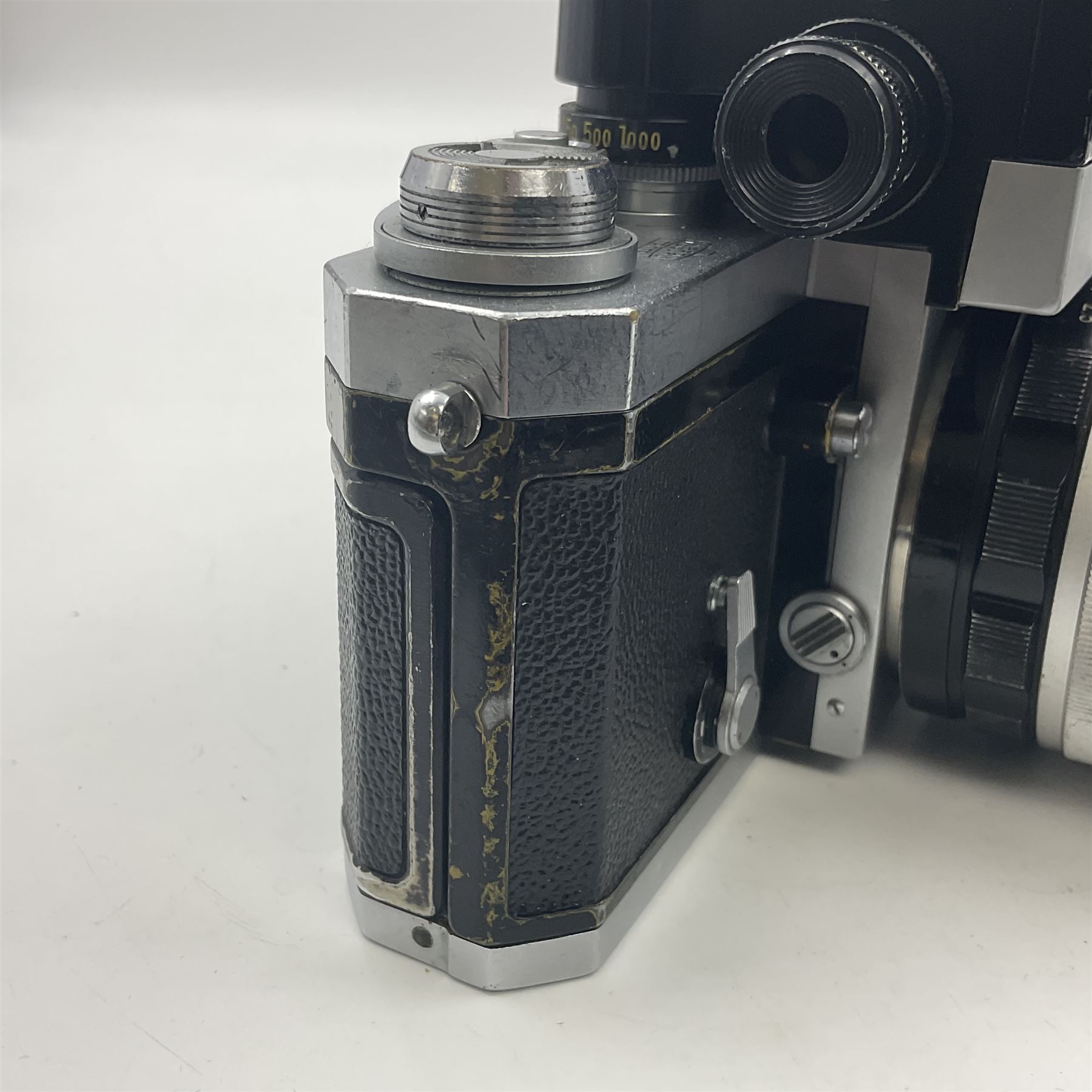 Nikon F Photomic NKJ camera body, marked 'US Dept of Defense ... U.S.A.F DA Nang, serial no. 6561811, with 'Nippon Kogaku NIKKOR-P Auto 1:2.5 f=105mm' lens, serial no. 212154