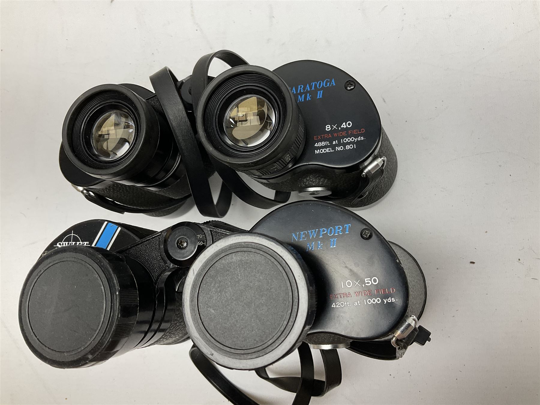 Eleven pairs of Swift binoculars, to include Greens 8x40, Saratoga 8x40, two pairs of Newport Mk II 10x50, Newport 10x50, Saratoga Mk II 8x40, Audubon 8.5x44, etc, 