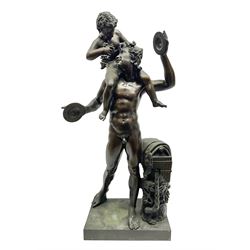 After the Antique, early 20th century bronze figure group, modelled as Pan holding cymbals, with infant Bacchus upon shoulders, stood beside a tree stump with fruiting vines, pan flute and clock, upon rectangular plinth, overall H70cm