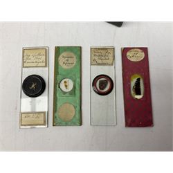  Brass field microscope, together with a cased microscope and twenty five microscope slides