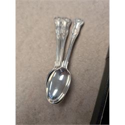 Group of silver, comprising mustard pots, open salts, napkin ring, spoons, sugar tongs and fruit knife, all stamped or hallmarked 