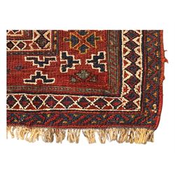 Persian-style wool rug, cream field with floral and geometric motifs, wide floral border (74cm x 142cm); Persian wool rug, beige field with dense floral patterns, narrow floral border (70cm x 144cm); Tribal wool rug, red and navy with diamond motifs (96cm x 60cm); Persian pictorial wool rug, black field with vase, birds, and floral border (70cm x 73cm)