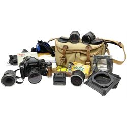 Pentax 67II camera with Asahi SMC Pentax - 6x7 ‘1:4 45mm’ lens, Asahi Takumar / 6x7 ‘1:4.5/75’ lens, Asahi Macro-Takumar / 6x7 ‘1:4/135’ lens, Asahi SMC Pentax - 6x7 ‘1:2.8 165mm’ lens, Asahi Pentax 6x7 rear converter ‘T6-2X’, lens filters and various other accessories, housed in a Billingham carry bag